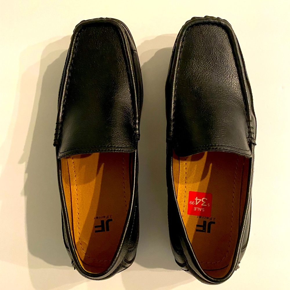 Men’s black loafers.
